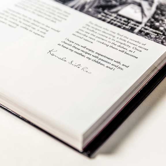 Closeup of the author’s signature on the foreword page spread.